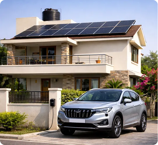 Luxury home with rooftop solar panels and electric car charging in driveway