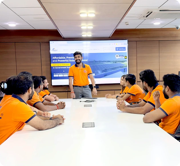 Solar energy company team discussing rooftop solar solutions in office meeting, highlighting professional solar installation services